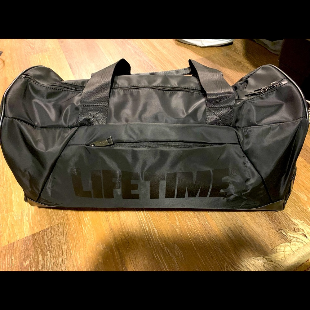 Lifetime Fitness Brand New Reflective Logo Nylon Duffel/Gym Bag, 9 Compartments